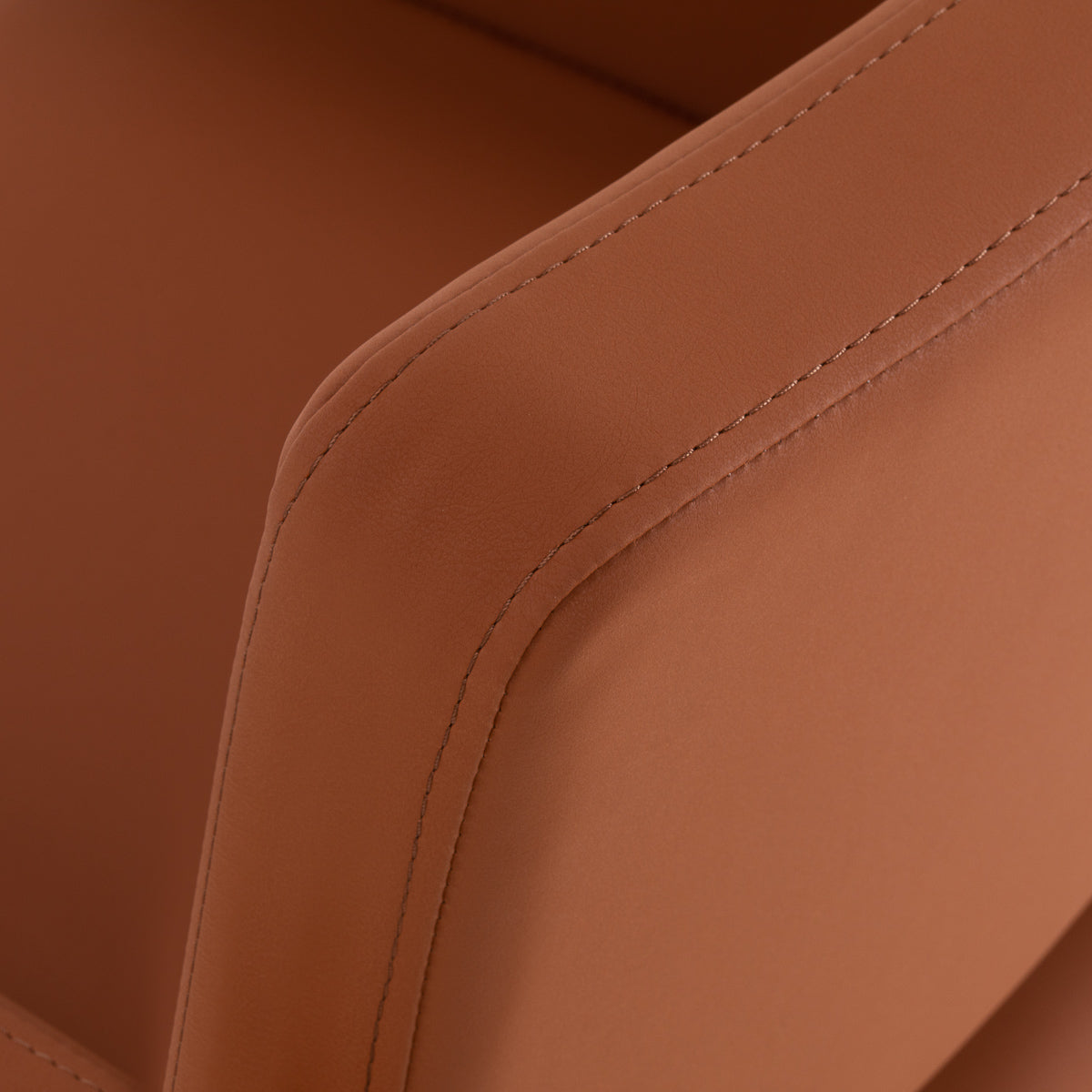 Gabbiano Vitoria brown hairdressing chair with padded seat and backrest, adjustable height, and armrests for salon styling.