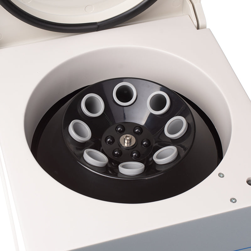 Laboratory plasma centrifuge TD4C by Beauty System with digital controls and stainless steel rotor for medical sample separation.