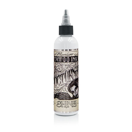 Nocturnal Shine White Legacy — butelka na białym tle, przykład opakowania z tej rodziny produktów
