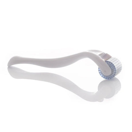 White facial roller with blue accents on a white background
