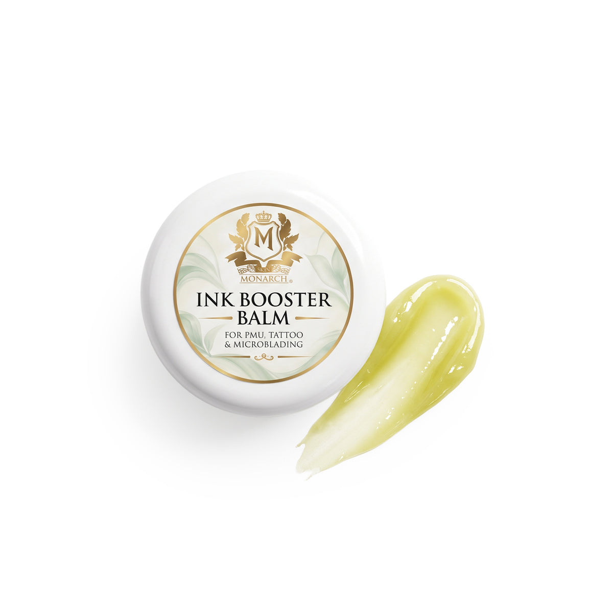 Skin Monarch Ink Booster Balm 30ml, wieczko obok smugi błyszczącego żółtego balsamu