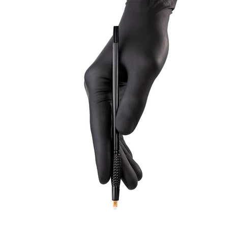 PhiBrows Blade & Shade KIT S 10pcs — disposable kit tool held in a gloved hand