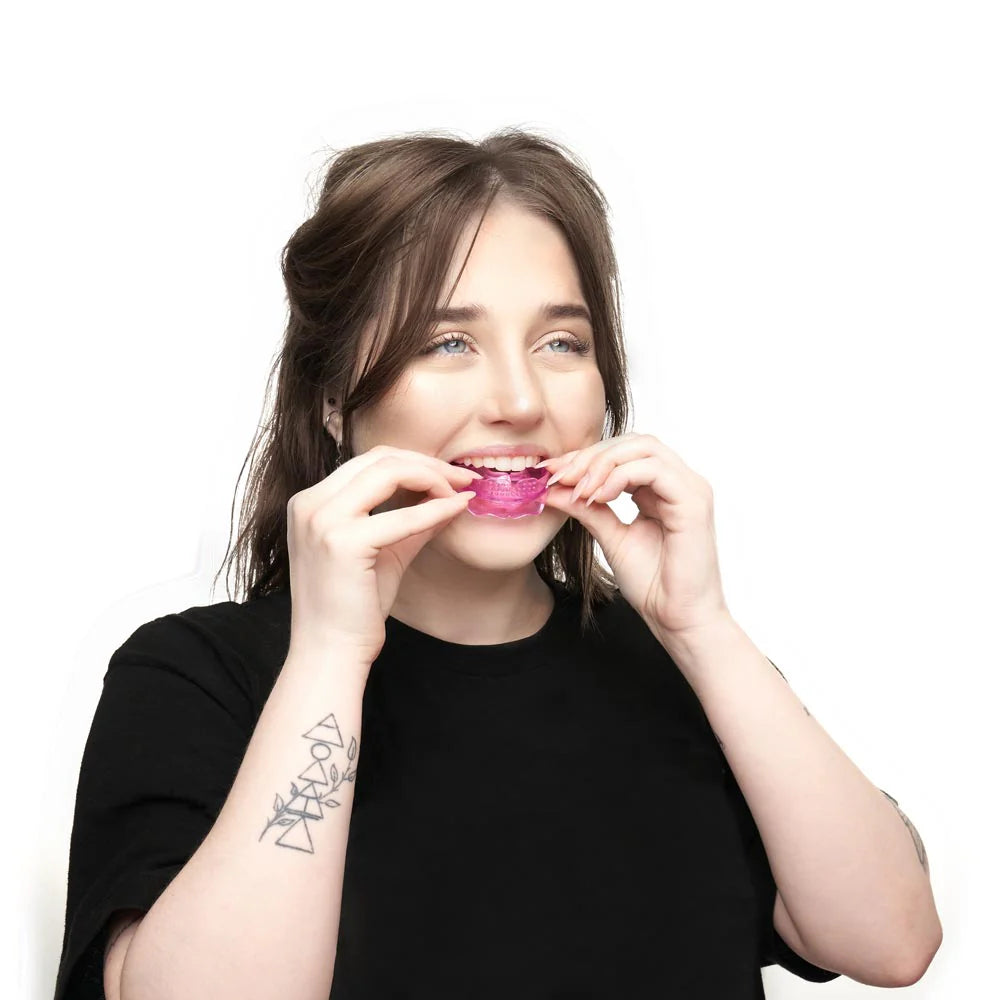 BVShop Ultimate Beauty Lip Assist Pink in a sleek tube, featuring a smooth pink lip balm with a glossy finish and compact design.