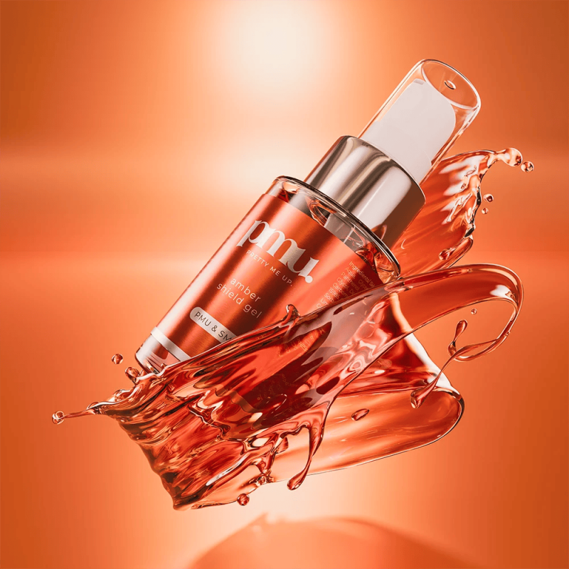 Kwadron PMU Pretty Me Up Amber Shield Gel 30ml bottle with label and clear cap, used for permanent makeup protection.
